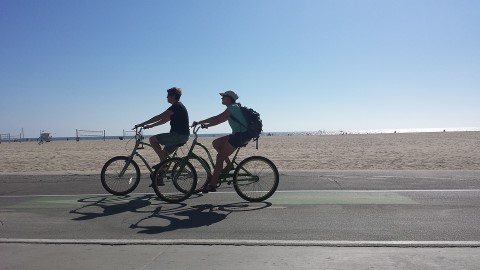 two-people-ride-bikes